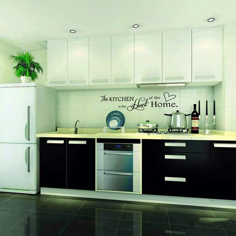 Modern kitchen with black and white cabinets featuring Kitchen Wall Stickers Set With Inspiring Quote The Kitchen Is The Heart Of The Home Vinyl Wall Decal
