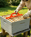 Beekeeper using Beekeeping Frame Spacers 2 Pack 9 Frame Spacer Tool For Beehive Boxes Pro Grade Beekeeping Supplies For Precise Frame Spacing Easy Setup And Long Lasting Hive Maintenance on a hive box.