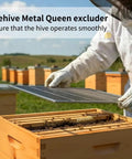 Beekeeper holding Metal Queen Excluder Set For 8 Frame Beehives, 3 Pack Beekeeping Equipment on hive