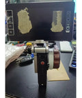 HangTon monitor mounting bracket on Tilta Nucleus-M hand unit for SmallHD monitor; 1/4 3/8 M4 screws.