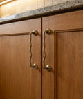Brushed Antique Brass Wavy Cabinet Pulls With Five Inch Hole Centers Go To Kitchen Cupboards And Dresser Vanities Sleek Solid Brass
