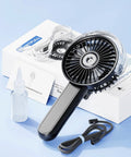 Misting Handheld Fan With 180 Degree Fold USB Rechargeable Personal Cooling Sprayer and accessories on table