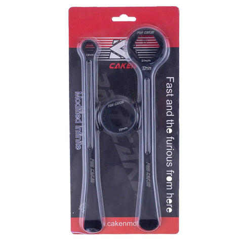Heavy Duty All In One Motorcycle Tire Change Kit displayed in packaging with hex wrench heads, tire iron levers, and spoon tool.