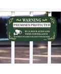 Real Sturdy Aluminum Video Surveillance Signs 2 Pack Keep Your Property Locked Down Smooth Motion Warning Decals For Homes And Buildings Zero Hassle Wall Mounting Setup Installed on a fence.