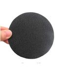 Grab These 30 Pc Four Inch Silicon Carbide Sanding Discs With Hook And Loop Backing For Super Fast Polishing Jobs Across All Grit Levels From Coarse To Mirror Finish Ready, 4 inch sanding disc in hand.
