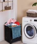 42L Collapsible Laundry Baskets Set Pack Of 2 Black Foldable Plastic Hamper For Dorms, Apartments, And Home next to a washing machine