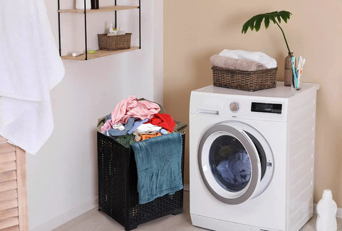 42L Collapsible Laundry Baskets Set Pack Of 2 Black Foldable Plastic Hamper For Dorms, Apartments, And Home next to a washing machine