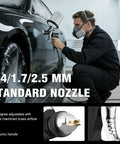 Heavy Duty HVLP Spray Gun Kit With Dual Cups And Precision Brass Nozzles Designed For Car Painting And Wood Finishing Delivering Silky Smooth Finish While Cutting Paint Waste Straight Fire Setup That Nails Diy Auto Body Jobs Like A Boss in use, focusing on ergonomic handle and 1.4/1.7/2.5 mm nozzle.