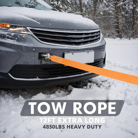 Tow rope, orange 12 ft heavy-duty strap attached to a car's front bumper in snow