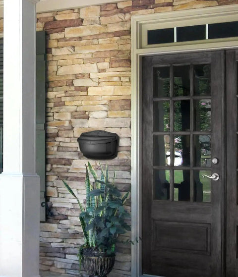 Villa Wall Mount Mailbox Large Rubbed Bronze Die Cast Aluminum With Powder Coat Inside And Out installed on stone wall by door
