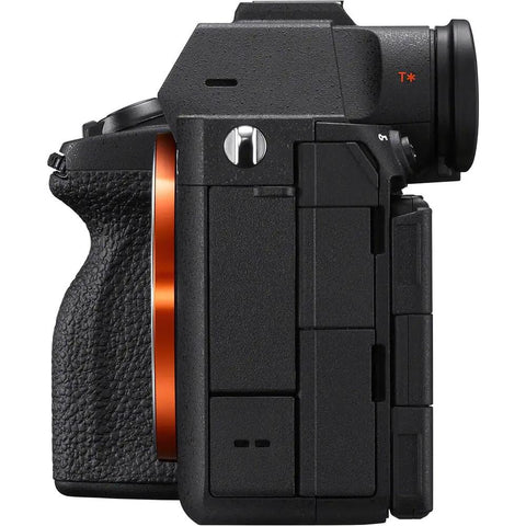 Side view of A7 V Mirrorless Camera Bundle With Wireless Microphone System And Do It All Accessory Pack 64GB Card U Grip Case Tripod