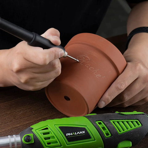 Person using 180W Rotary Tool Kit With 6 Variable Speeds And Flex Shaft 8000 To 32000 RPM All In One Heavy Duty Power Tool Workhorse