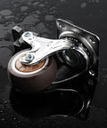 Heavy Duty 1.5 Inch Swivel Caster Wheels Featuring Lockable Rubber Tread And Screw In Mount shown on a wet surface.