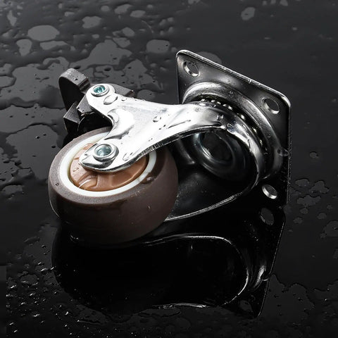 Heavy Duty 1.5 Inch Swivel Caster Wheels Featuring Lockable Rubber Tread And Screw In Mount shown on a wet surface.