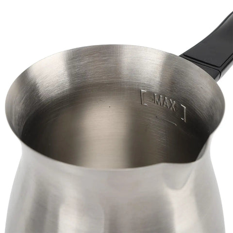 Close-up of stainless steel Electric Turkish Coffee Maker 600Ml Capacity With Even Heating For Coffee Tea And Milk interior and handle