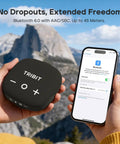 Person holding StormBox Micro 3 Portable Bluetooth Speaker With IP68 Waterproofing, compatible phone shows connection in mountain setting.