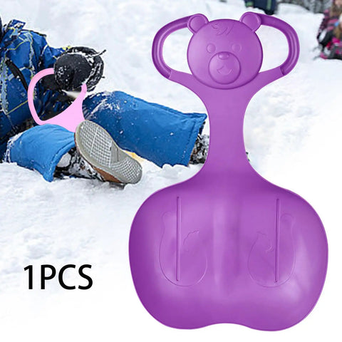 Purple Downhill Snow Sled with Handle for Kids and Adults next to person in snow, showing large luge style, 56cm by 36cm.