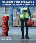 Worker carrying 600 CFM Air Mover Blower Fan, showcasing stackable design for efficient storage in industrial setting. Ideal for water damage restoration.