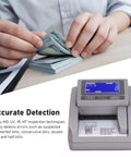 High Efficiency Money Counter Machine With LED Display And Counterfeit Detector on desk with person handling bills