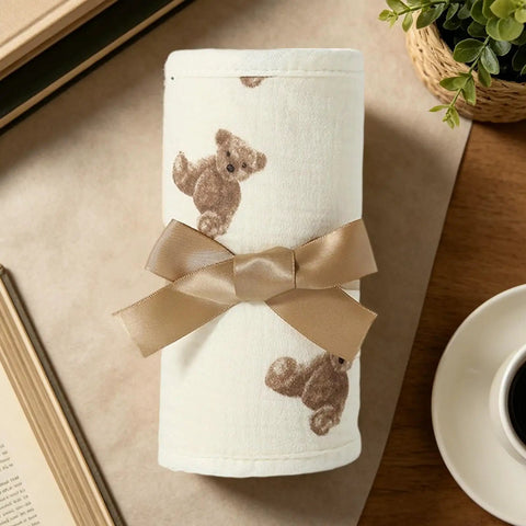 Breathable Cotton Gauze Bed Rail Teething Protector For Crib Sides rolled with teddy pattern and beige ribbon