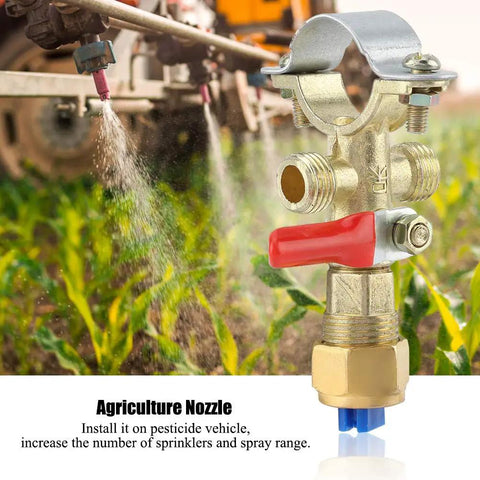 Heavy Duty Wide Fan Spray Nozzle Made From Zinc Alloy For Agricultural Gardening And Aquaculture Spraying Equipment Delivering Broad Coverage Durable Construction Easy To Use And Built To Last shown close-up with crops