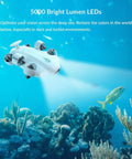 4K VR Underwater Drone With Robotic Arm For Deep Sea Exploration, 100m Range, Rugged Remote System illuminating coral reef