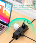 Nine Outlet Surge Protector Power Strip With Three Side Design in use on desk with laptop, 10 Foot Cord, 900 Joules, black