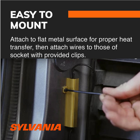 SYLVANIA load equalizer module with gold finned heatsink mounted to vehicle body, wiring visible