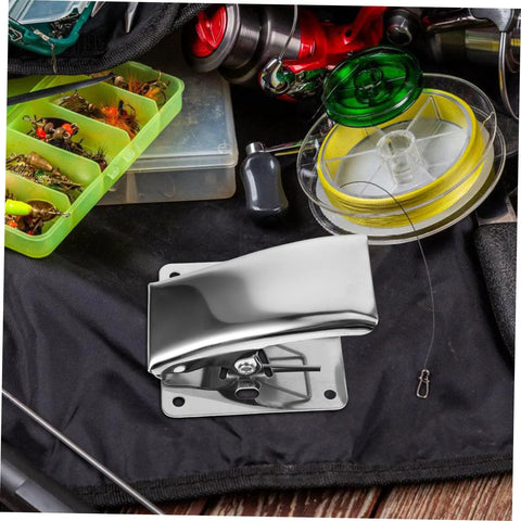 Fish cleaning clamp, stainless steel, front view, mounted on base plate for secure grip.