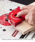 Shop Tested Street Smart Radius And Chamfer Quick Jig Deluxe Set featuring 18 Router Table Templates in use for precise chamfer cuts.