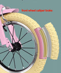 Close-up of front wheel with pneumatic tire and caliper brake on Three Wheel Cruiser Tricycle With Rear Passenger Seat And Backrest.