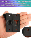 Stainless Steel 90 Degree Right Angle Sliding Door Lock for Barn Doors, 3.17 Inch Bolt, Matte Black Finish in hand.