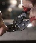 Close-up of Left Cut Offset Aviation Snips 10 Inch Workhorse cutting sheet metal, showcasing heavy duty CR steel and molybdenum blade.