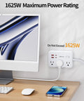 Heavy Hitter Power Strip Surge Protector With Six Wide Spread Outlet Plugs And Four Fast Charge USB Ports Including Dual Type C Inputs, shown mounted at a desk with a computer.