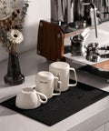 Coffee mugs and frothing pitcher near espresso machine, featuring Milk Frothing Pitcher 12oz 350ml Stainless Steel For Espresso And Latte Art
