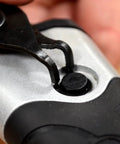 Close-up of Beast Of A 10 Piece Snap Ring Pliers Set For Internal And External Rings removing a retaining ring