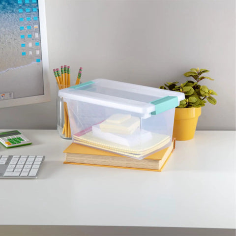 Sixteen Pack Clip Boxes Stackable Clear Plastic Storage Bins With Latching Lids on desk with books and stationery