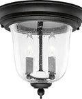 Ashmore Collection 2-Light Clear Seeded Glass Outdoor Close-To-Ceiling Light In Textured Black Finish with lantern style