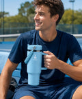40 Oz Double Wall Insulated Travel Tumbler With Detachable Paracord Handle and Leakproof Lid, great for sports.