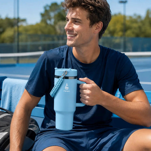 40 Oz Double Wall Insulated Travel Tumbler With Detachable Paracord Handle and Leakproof Lid, great for sports.