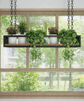 Dope Industrial Wood And Iron Hanging Shelf Rack For Kitchen Plants Overhead Ceiling Storage Plant Stand With Railing Sturdy Floating Shelves For Bars Restaurants Garages And Home Decor visible in a front view, with green plants displayed.