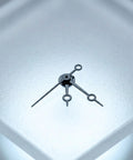 Black metal watch hands set compatible with NH35 364R 7S movements replacement parts on a white surface