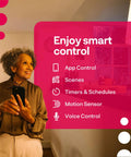 Woman using smartphone to control home automation with Zigbee Smart Plugs 2-Pack For Home Automation That Plays Nice With Philips Hue Alexa