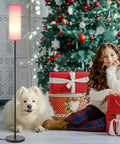 Pink Shade Floor Lamp For Living Room And Bedroom, Tall 65 Inch Standing Lamp With Black Iron Pole next to Christmas tree and girl