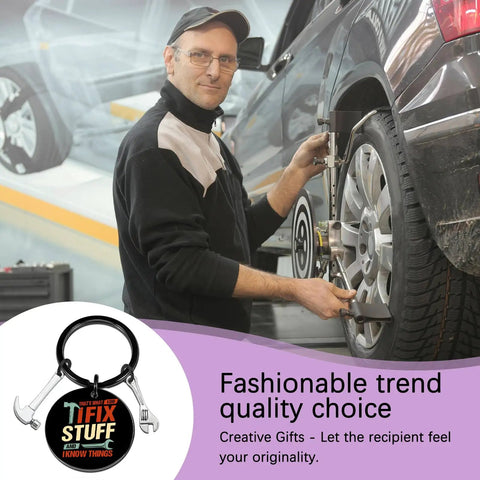 Mechanic working on car tire with 'I Fix Stuff and I Know Things' keychain shown for Keychain Gift For Men I Fix Stuff And I Know Things Ideal Dad Gift For Mechanic Handyman Construction Worker Engineer Husband Grandfather Birthday Or Fathers Day Gift For Any Proud Dad Who Fixes Stuff And Keeps Projects Rolling.