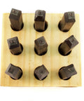 Rock Solid Wire Rope Sling Identification Tags Built Tough As Nails For Daily Rigging Grind Osha Compliant Aluminum Or Stainless Steel Marker Plates Pack Of Fifty on a wooden holder.