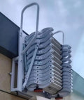 Slick Electric Telescopic Attic Staircase Built With A Rock Solid Alloy Frame And Extra Wide Non Slip Steps for smooth loft access, mounted on a wall.