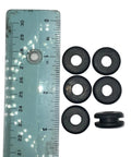 Pack Of Four Rock Solid Rubber Grommets With Five Sixteenths Inch Bore And Three Quarter Outer Profile, displayed next to a ruler.