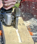No Bull 4 Inch 14 Tooth Carving Saw Disc For Angle Grinders in use, cutting wood, showing detailed blade and tool action.