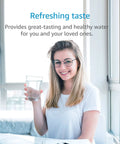 Woman enjoying a glass of water filtered by Replacement 750R Level 1 Water Filter Cartridge 2 Pack Delivers Up To 2500 Gallons Of Clean Water